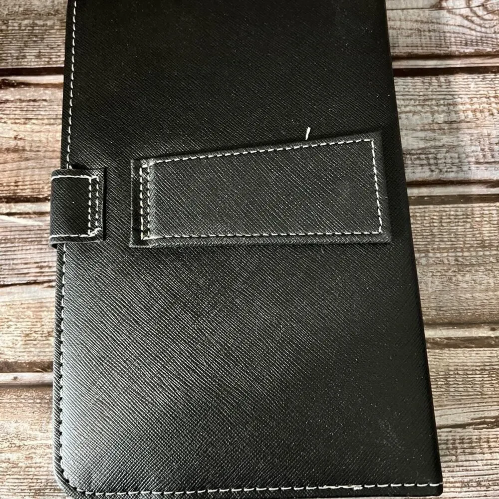 Tablet case and Keyboard. Can hold up to a 9” tablet.